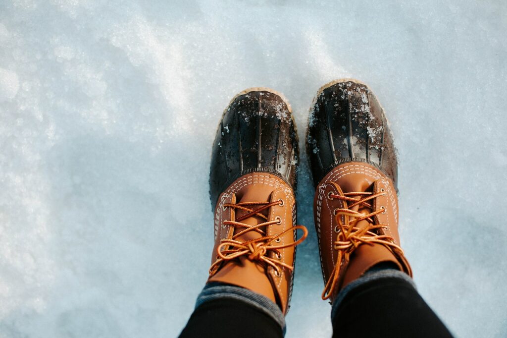 Want to know how to clean hiking boots like this one on the snow? Read on!